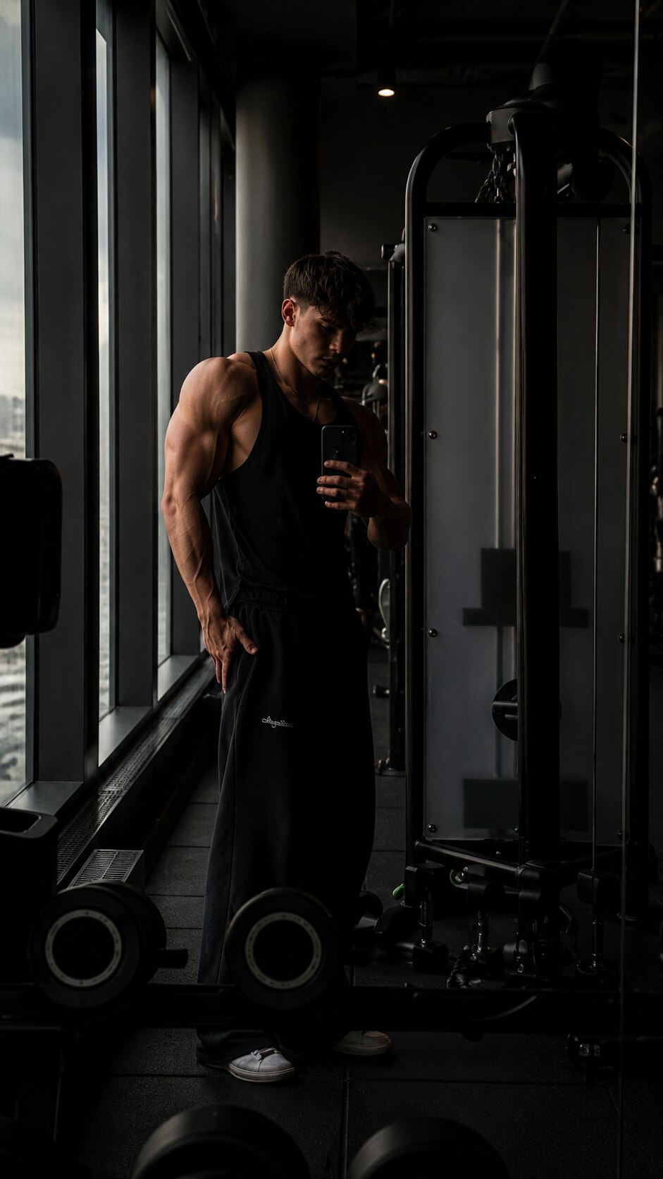 Athlete training in a dark industrial gym